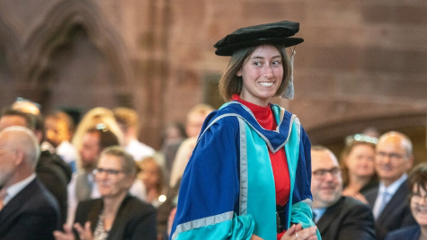 A PhD student at graduation.