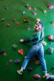 Student at a climbing wall