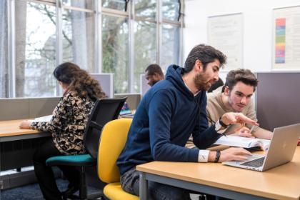 Students working together in a library