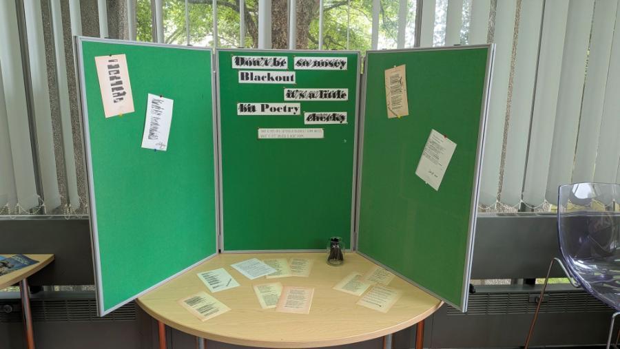 Blog image, notice board with posters of poetry for blackout poetry activity