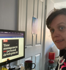 Kay Ashton Insta Photo, Kay sitting at her desk with ebook displayed on her screen