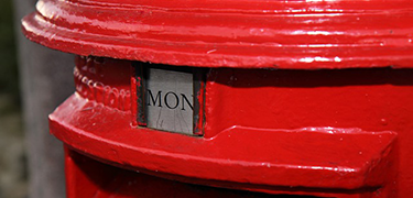 top of a red postbox