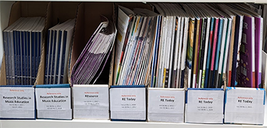 Library resources - image of journals on shelf
