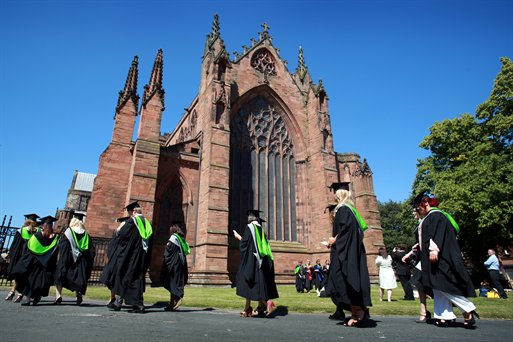 ProcessingGraduandsBlueSky, Students walking into Carlisle Cathedral for their graduation 